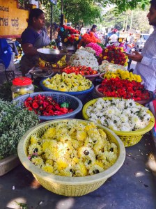 roadside flower stall. bangalore, india. april 2015.