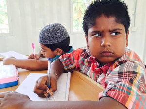 my favourite little buddy in one of the summer camp centers. malavalli, india. april 2015.