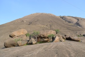 preparing to scale the monolith. savandurga, india. may 2015.