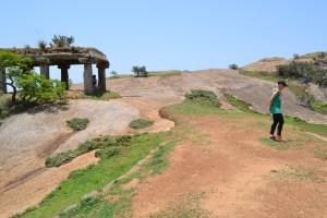 bettina explores the top of the monolith. savandurga, india. may 2015.