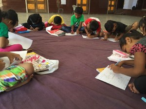 hard at work on their creations. bombay, india. may 2015.