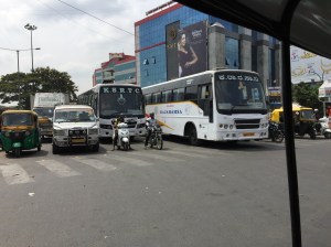 buses leaving the shantinagar bus station. bangalore, india. march 2015.