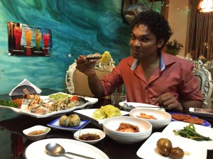he was really proud because he finally learned how to use chopsticks. bangalore, india. june 2015.