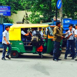 seeing all these children piled into autos reminded me of watching this sight as a child on my masi's balcony in surat. bangalore, india. july 2015.
