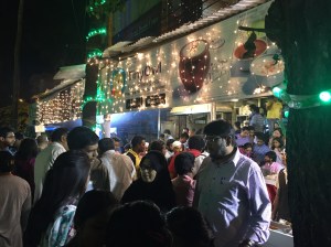 people lined up outside chichabas to try some kebabs. bangalore, india. july 2015.