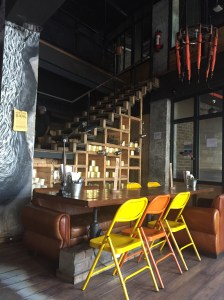 seating options and stairs leading to the first floor. bangalore, india. july 2015.