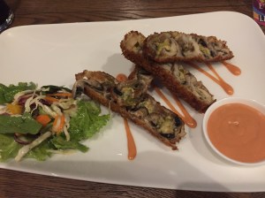 delicious cheesy shrooms. bangalore, india. september 2015.
