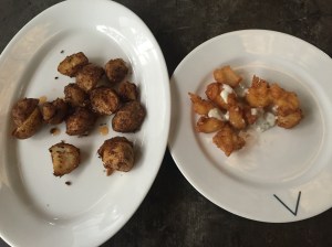 even more appetizers: potatoes and fried prawns. bangalore, india. september 2015.