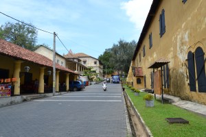 walking past the museum. galle, sri lanka. september 2015.