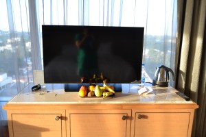 entertainment center, mini bar, and complimentary fruits. bangalore, india. october 2015.